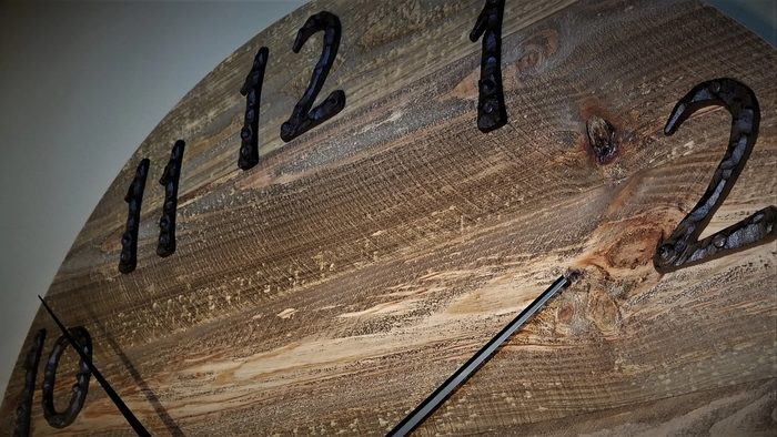 Detail of a pallet wood clock face